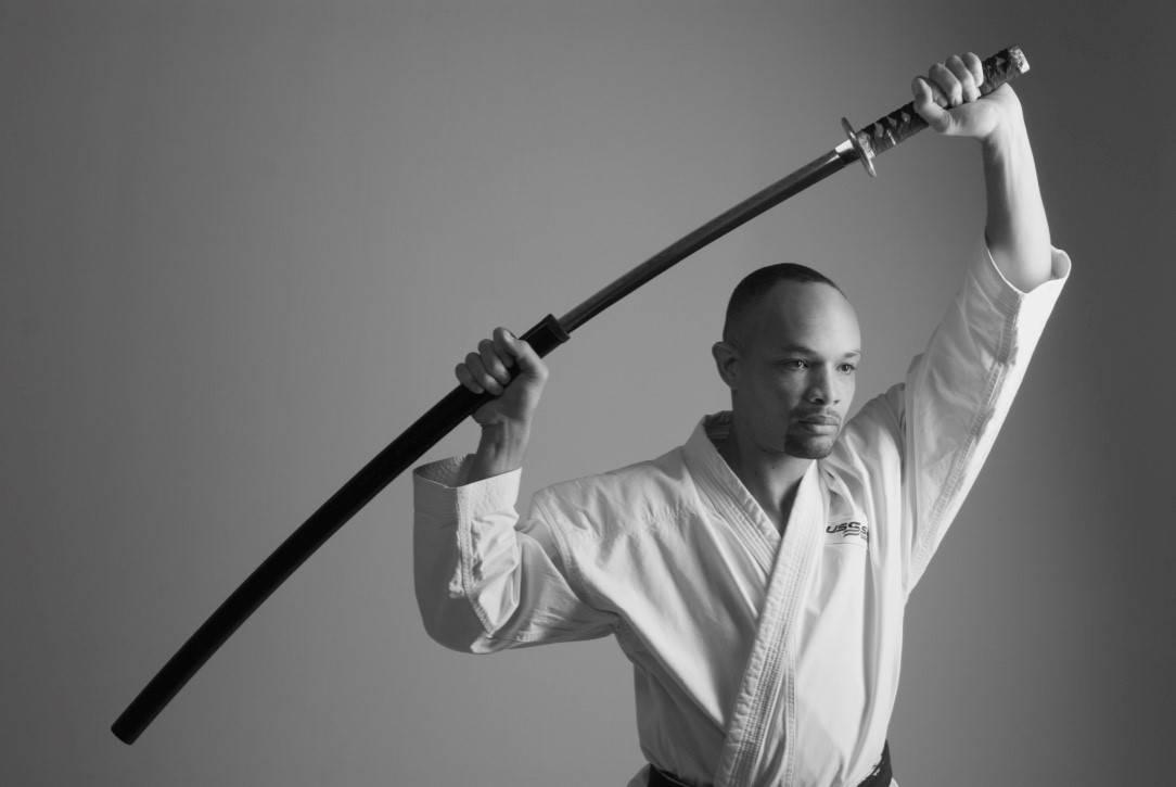 Christopher Wilks photo in pose with sword